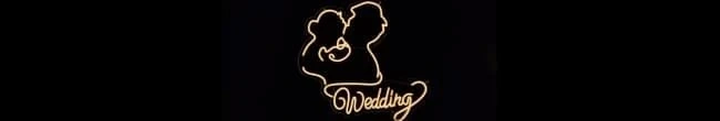 Neonski natpis - Wedding (sa siluetama para u poljupcu)